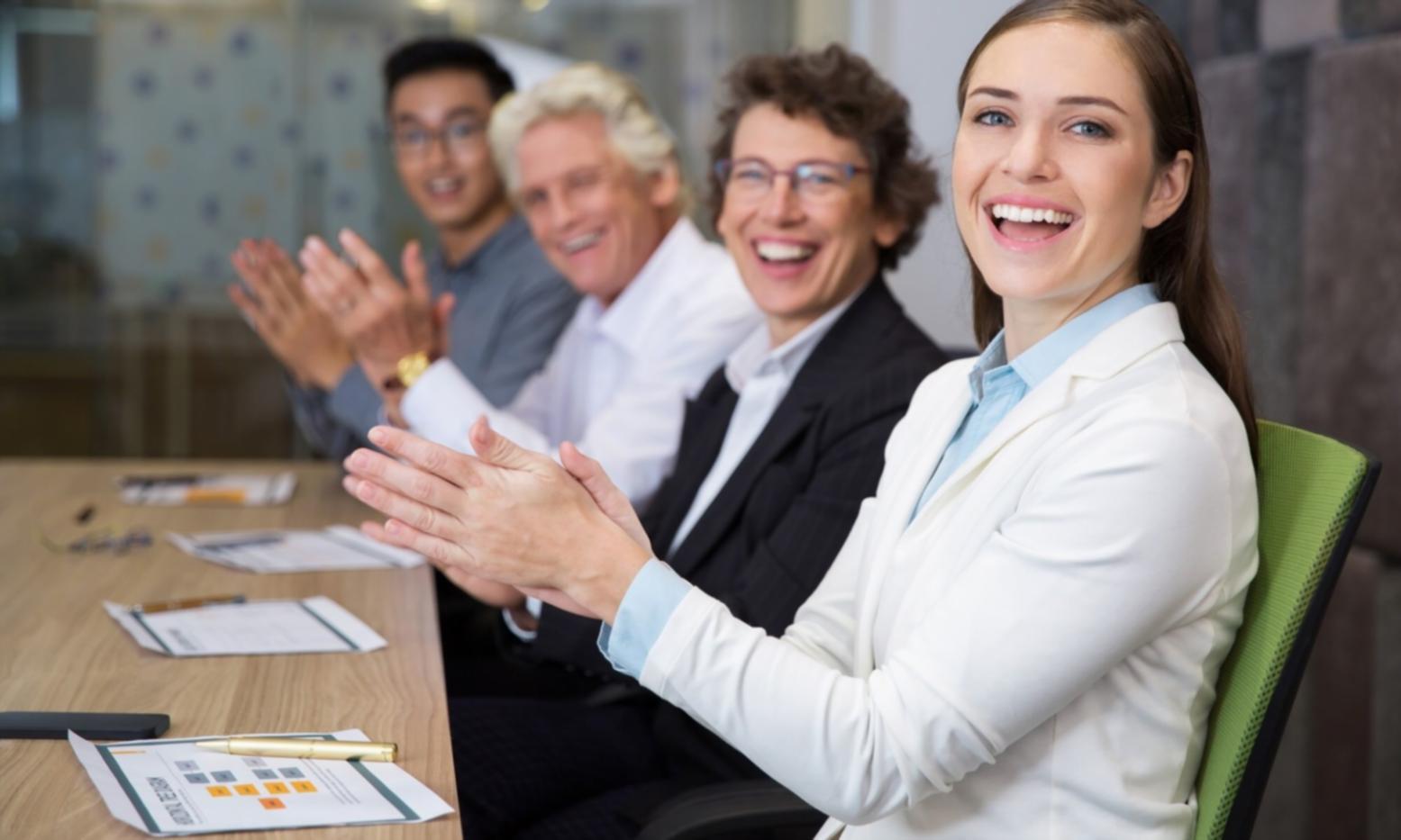 Professional team collaboration in modern office space focused on financial communication