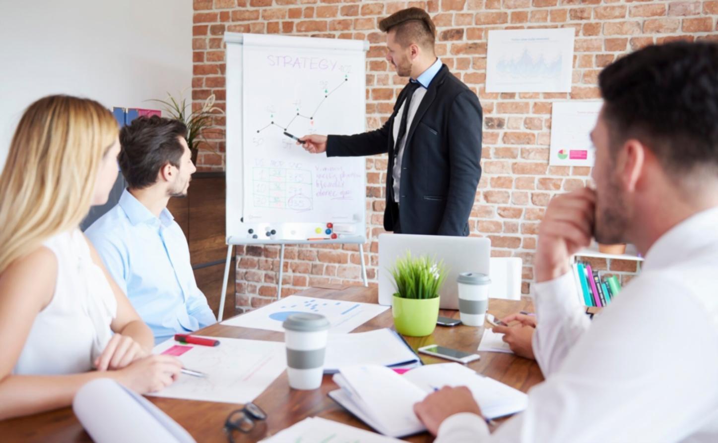 Finance communication classroom environment showing collaborative learning setup